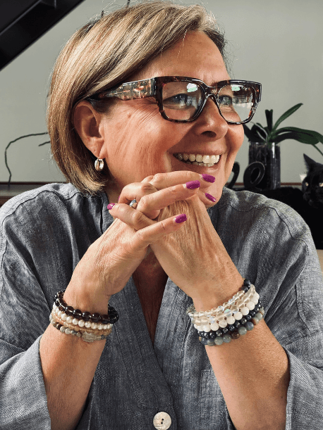 Brenda in her home office, reflecting on her mindfulness practice